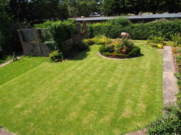 View of rear garden from bedroom three