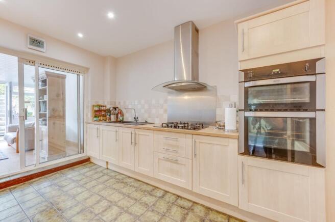 KITCHEN, UTILITY ROOM, DINER AND LIVING ROOM