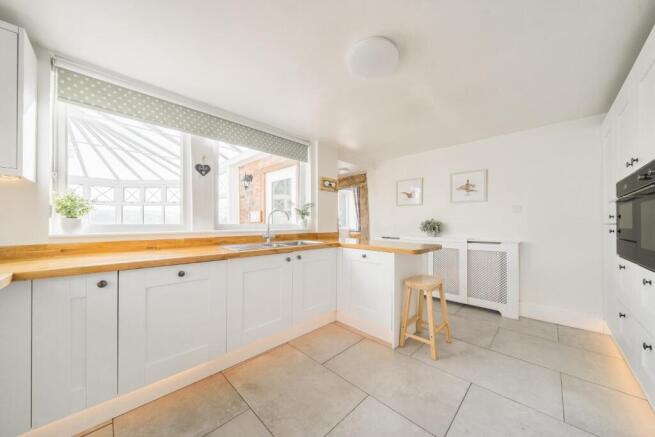 Kitchen with conservatory view.jpg