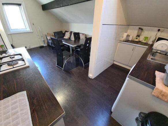 Bright and well-maintained kitchen area featuri...