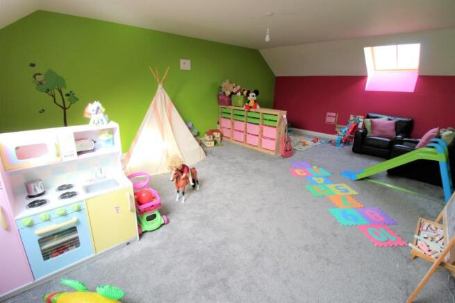 BEDROOM FIVE (TOP FLOOR)