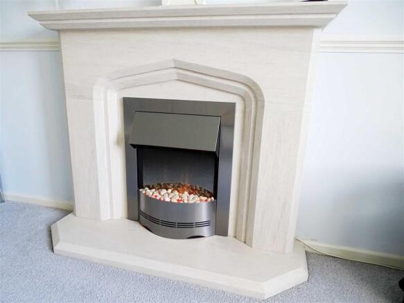 FEATURE LIMESTONE FIRE PLACE