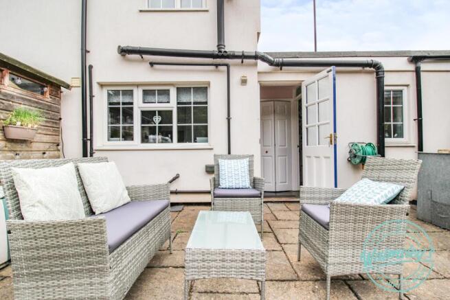 Rear view & sunny patio