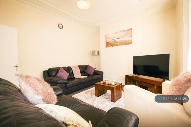 Large And Bright Living Room With Comfy Sofas