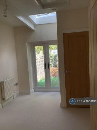 Snug/ Bedroom 3 With Doors  To Astro Turf Veranda