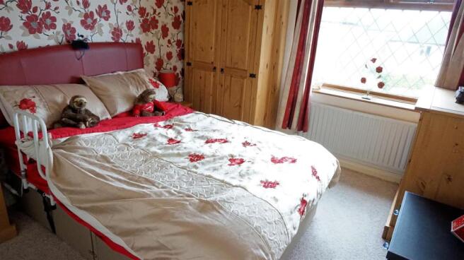 BEDROOM ONE (REAR)