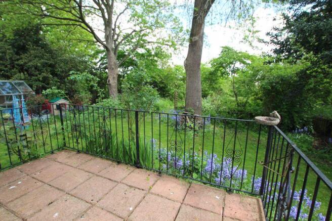 Rear garden with raised patio area