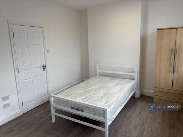 Double Bedroom With Cupboard And Draws