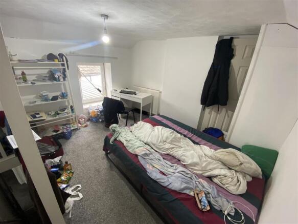 Bright double bedroom with study desk and stora...