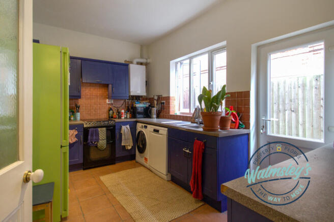 Kitchen breakfast room with doorway to side access