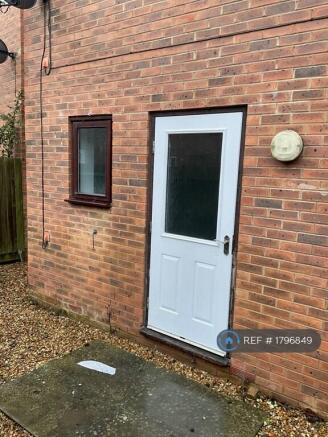 Living Door To The Garden