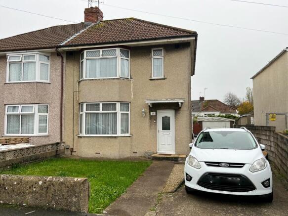 House Front with Driveway & Garage