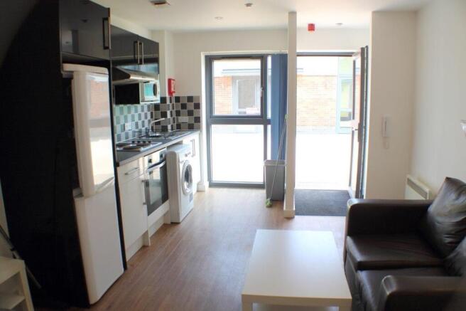 Bright modern kitchen with open living space...
