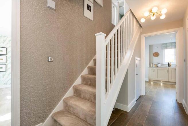 Bright hallway with under stair storage