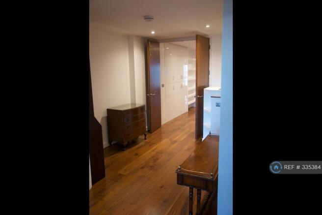 Landing With Coat Cupboard