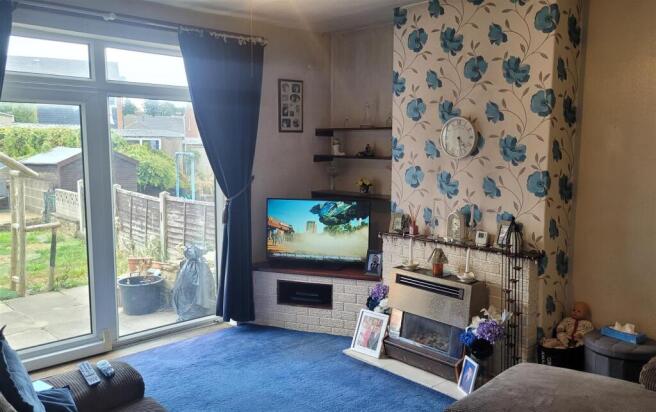 Living room with garden and inside room.jpg