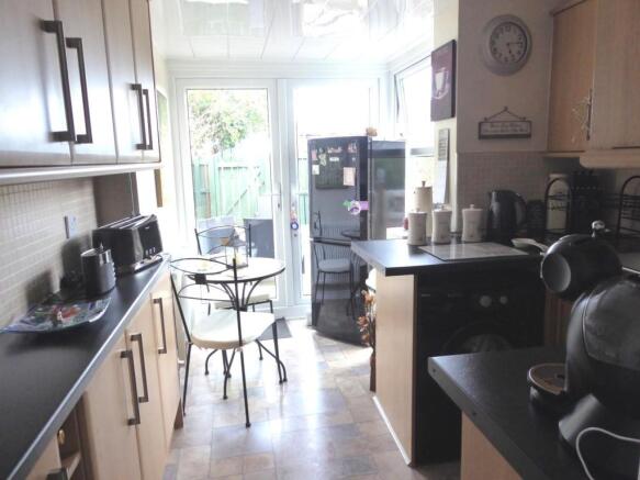 KITCHEN/SUN PORCH