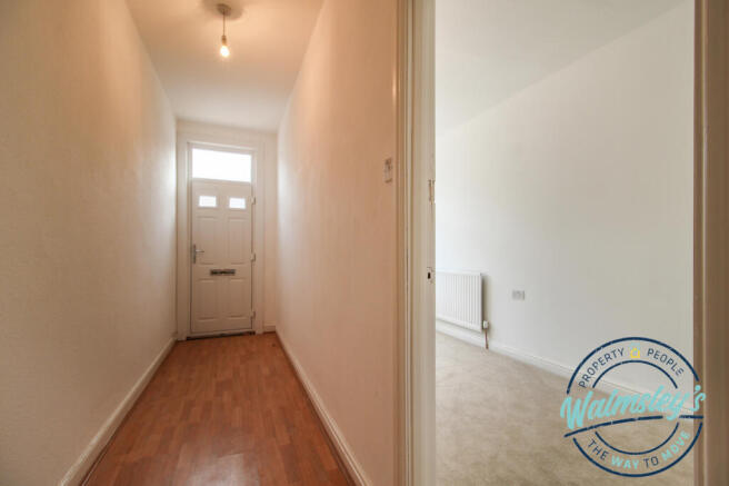 Entrance hallway & adaptable dining room/bedroom f