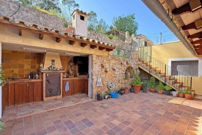 02-andratx-Charmantes Dorfhaus mit mediterranem Gartenparadies und traumhaftem Bergblick-kaufen-patio