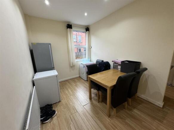 A bright, modern living room featuring a window...