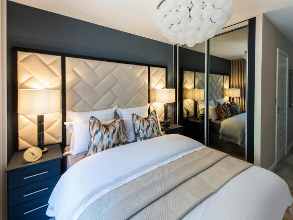 The Mill York house internal apartment image of bedroom with double bed and fitted wardrobes