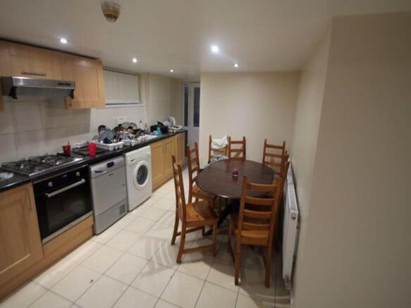 A bright, well-maintained living space with a f...