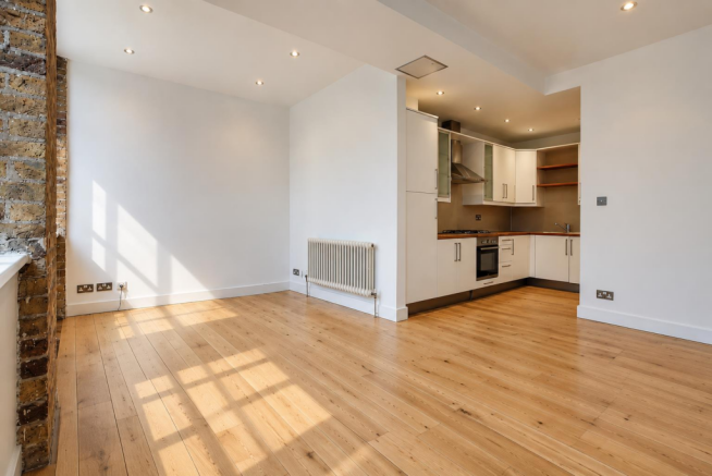 Sunlit Industrial Open-Plan Apartment.png
