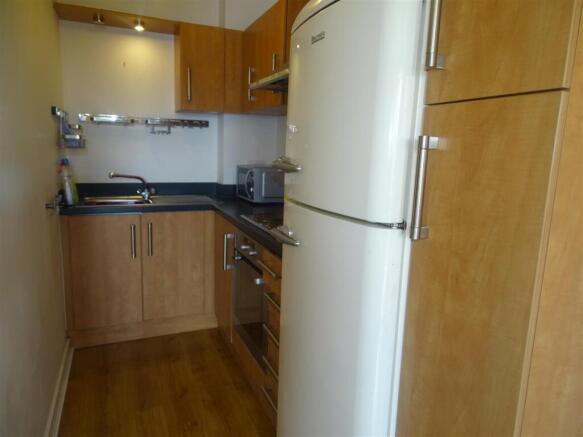 Modern kitchen with integrated appliances...