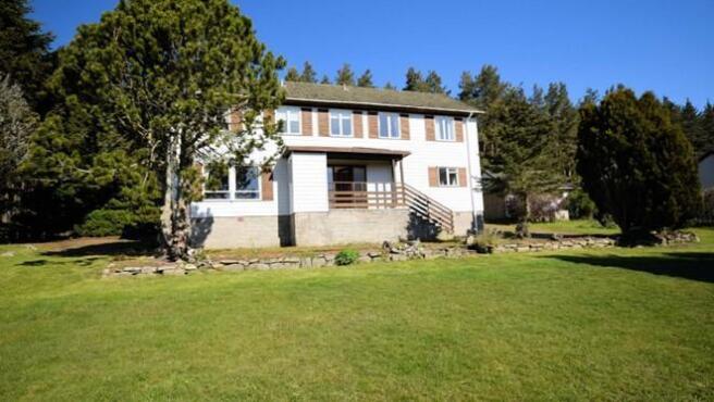 Front of the property and large garden