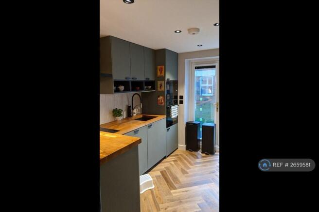 Kitchen Area And Door To Garden