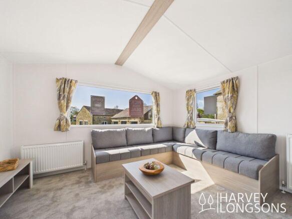 Open-plan lounge inside Atlas Fanfare holiday home