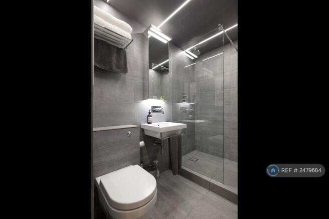 Tiled Bathroom w/ Shower Room