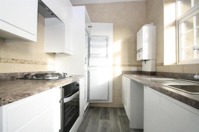 Kitchen with fridge.JPG