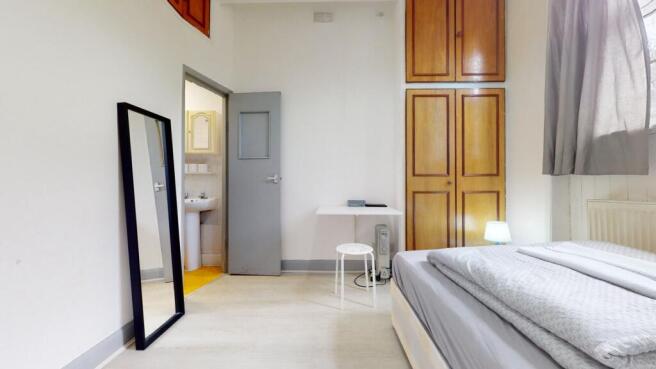 Bright bedroom with ample storage and ensuite...
