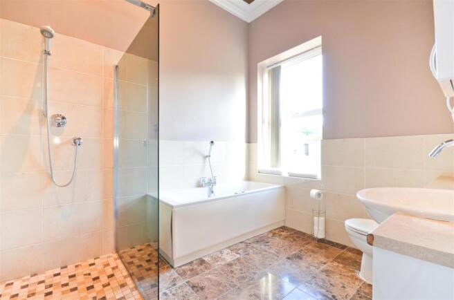 Family Bathroom with walk in shower.JPG