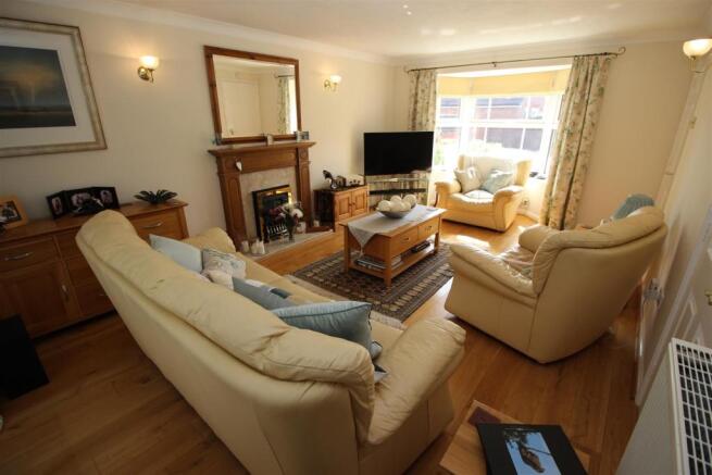 Sitting Room featuring a Bay Window