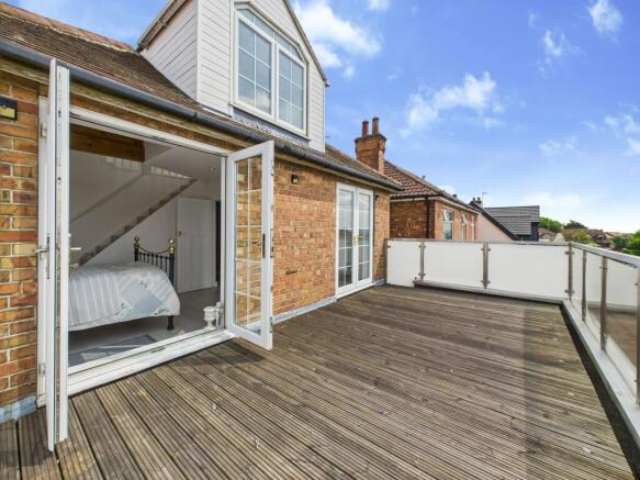 French doors from Bedroom One onto Balcony