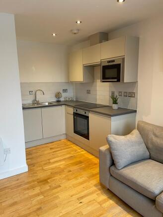 Modern kitchen with integrated appliances...