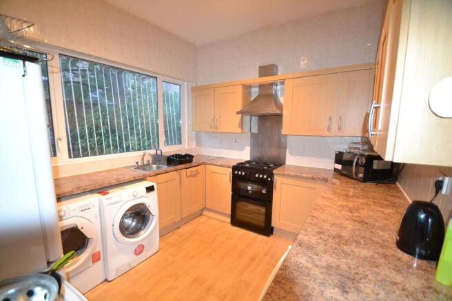 Bright and functional kitchen with ample counte...