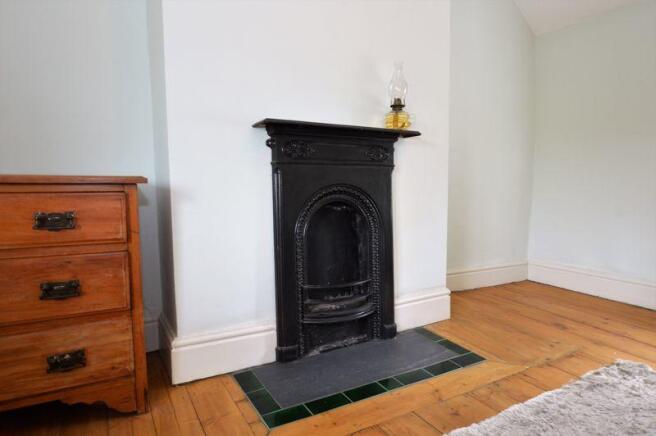 DECORATIVE FIREPLACE TO BED 2