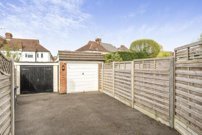 Garage with side entrance into garden
