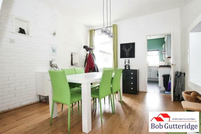 THROUGH LOUNGE/DINING ROOM