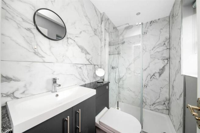 EN-SUITE SHOWER ROOM