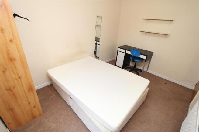 Bright bedroom with dedicated study workspace...