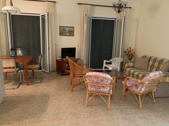 living area with doors to balcony