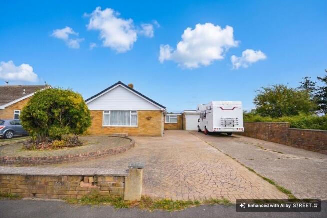 Driveway and double garage.