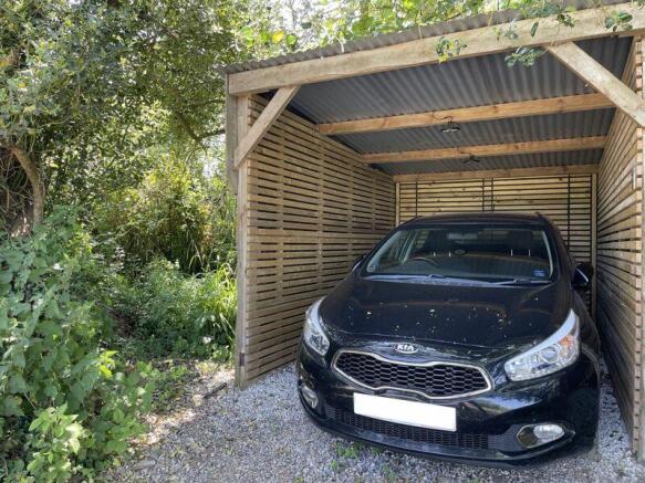 Allocated Car Port With Storage