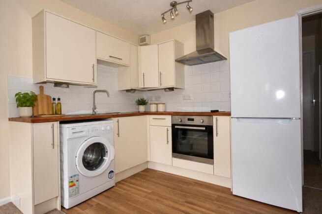 Kitchen - Virtually staged to illustrate the poten