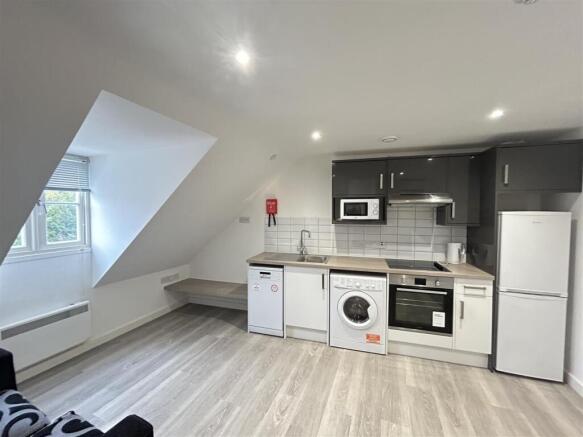 Modern kitchen with integrated appliances...