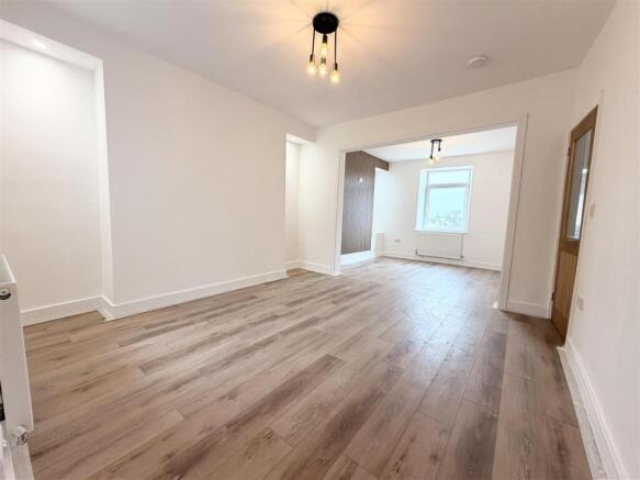 Bright, spacious lounge with modern flooring...
